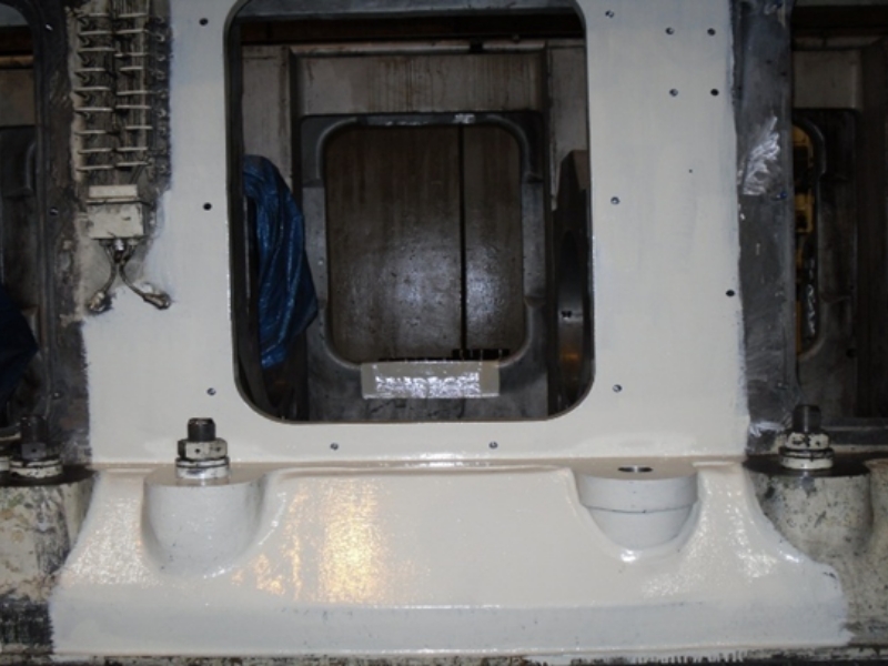 Repairs on cracked crankcase door and bedplate before/after